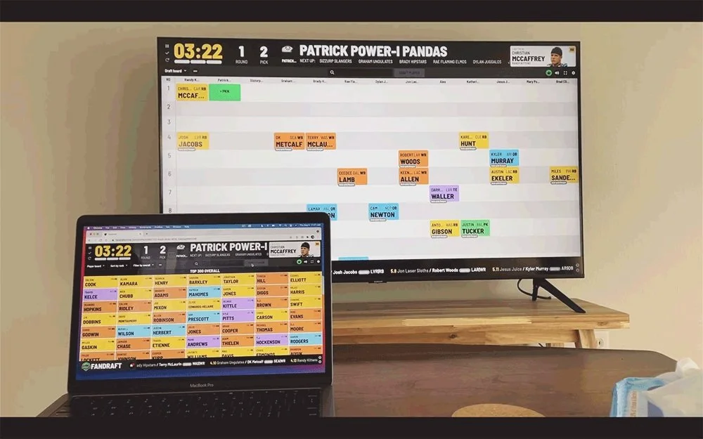 An owner drafting online in FanDraft from a laptop
