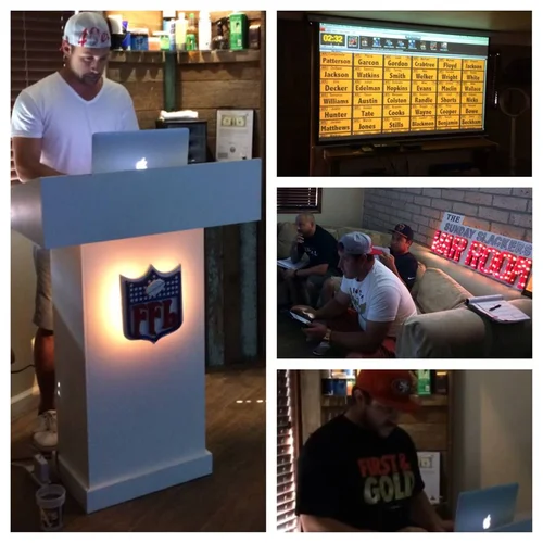 A league watching the FanDraft draft board during their fantasy football draft