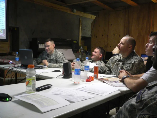 Service members running a FanDraft fantasy football draft from a tent in Afghanistan